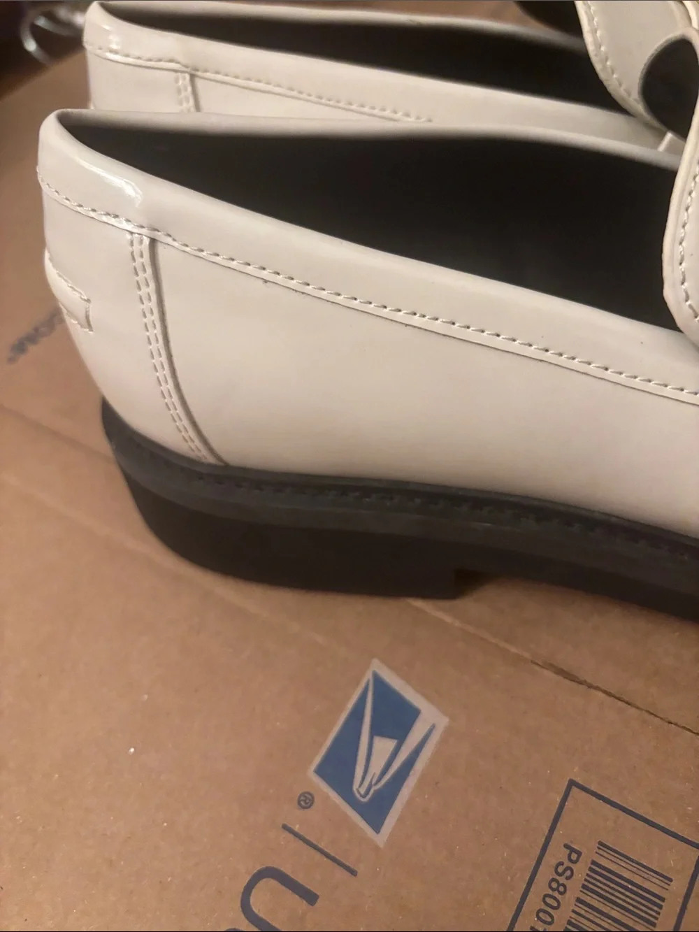 NWOT Guess White Slip-On Penny Loafers with Gold Triangle Logo